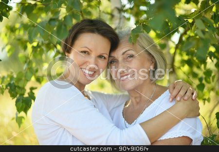 To use this stock image in your creative project, please select the size you need over to the right and click the "Add to Cart" button.
Your downloaded image will come with the Cutcaster watermark removed so don’t worry about the watermark you see on this page. Mother and daughter in park stock photo, Mother and her nice daughter in park by Ruslan Huzau