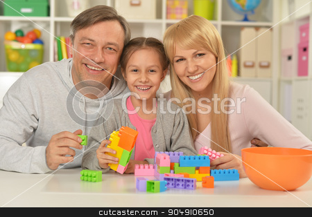 To use this stock image in your creative project, please select the size you need over to the right and click the "Add to Cart" button.
Your downloaded image will come with the Cutcaster watermark removed so don’t worry about the watermark you see on this page. happy family playing at home stock photo, Portrait of happy family playing at home by Ruslan Huzau
