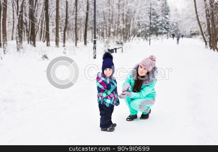 To use this stock image in your creative project, please select the size you need over to the right and click the "Add to Cart" button.
Your downloaded image will come with the Cutcaster watermark removed so don’t worry about the watermark you see on this page. happy family mother and child baby daughter on a winter walk in the woods stock photo, happy family mother and child baby daughter on a winter walk in the woods by Satura86