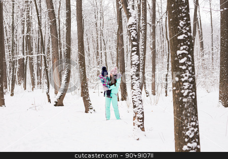 To use this stock image in your creative project, please select the size you need over to the right and click the "Add to Cart" button.
Your downloaded image will come with the Cutcaster watermark removed so don’t worry about the watermark you see on this page. happy family mother and child baby daughter on a winter walk in the woods stock photo, happy family mother and child baby daughter on a winter walk in the woods by Satura86