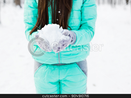 To use this stock image in your creative project, please select the size you need over to the right and click the "Add to Cart" button.
Your downloaded image will come with the Cutcaster watermark removed so don’t worry about the watermark you see on this page. girl holding snow in hands stock photo, Young girl holding snow in her hands by Satura86
