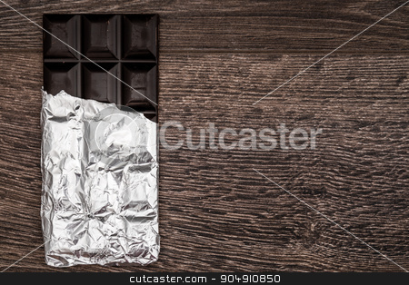To use this stock image in your creative project, please select the size you need over to the right and click the "Add to Cart" button.
Your downloaded image will come with the Cutcaster watermark removed so don’t worry about the watermark you see on this page. Dark Chocolate Bars on Foil and Wooden Table stock photo, Dark Chocolate bars on foil and brown wooden background with copy space by OZMedia