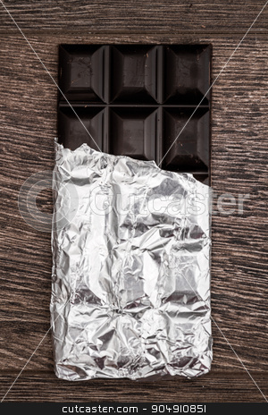 To use this stock image in your creative project, please select the size you need over to the right and click the "Add to Cart" button.
Your downloaded image will come with the Cutcaster watermark removed so don’t worry about the watermark you see on this page. Dark Chocolate Bars on Foil and Wooden Table stock photo, Dark Chocolate bars on foil and brown wooden background by OZMedia