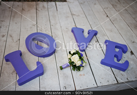 To use this stock image in your creative project, please select the size you need over to the right and click the "Add to Cart" button.
Your downloaded image will come with the Cutcaster watermark removed so don’t worry about the watermark you see on this page. Purple decor wedding word love with bouquet and rings stock photo, Purple decor wedding word love with bouquet and rings by Andrii Shevchuk