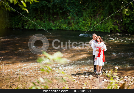 To use this stock image in your creative project, please select the size you need over to the right and click the "Add to Cart" button.
Your downloaded image will come with the Cutcaster watermark removed so don’t worry about the watermark you see on this page. Love story of loving couple in national Ukraine dress. Near the stock photo, Love story of loving couple in national Ukraine dress. Near the mountain river by Andrii Shevchuk