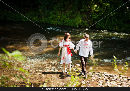 To use this stock image in your creative project, please select the size you need over to the right and click the "Add to Cart" button.
Your downloaded image will come with the Cutcaster watermark removed so don’t worry about the watermark you see on this page. Love story of loving couple in national Ukraine dress. Near the stock photo, Love story of loving couple in national Ukraine dress. Near the mountain river by Andrii Shevchuk