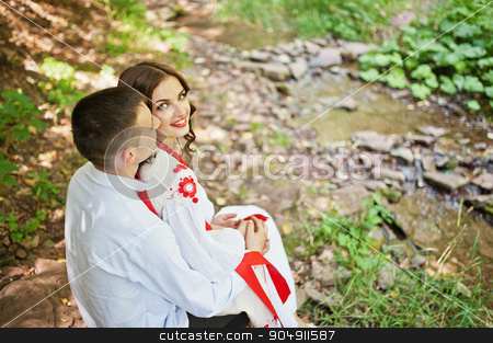 To use this stock image in your creative project, please select the size you need over to the right and click the "Add to Cart" button.
Your downloaded image will come with the Cutcaster watermark removed so don’t worry about the watermark you see on this page. Love story of loving couple in national Ukraine dress. On the wo stock photo, Love story of loving couple in national Ukraine dress. On the wood with rocks by Andrii Shevchuk