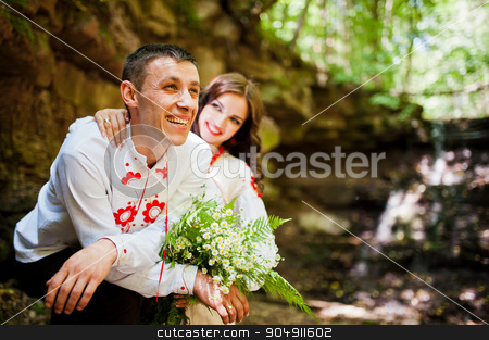 To use this stock image in your creative project, please select the size you need over to the right and click the "Add to Cart" button.
Your downloaded image will come with the Cutcaster watermark removed so don’t worry about the watermark you see on this page. Love story of loving couple in national Ukraine dress. On the wo stock photo, Love story of loving couple in national Ukraine dress. On the wood with rocks by Andrii Shevchuk