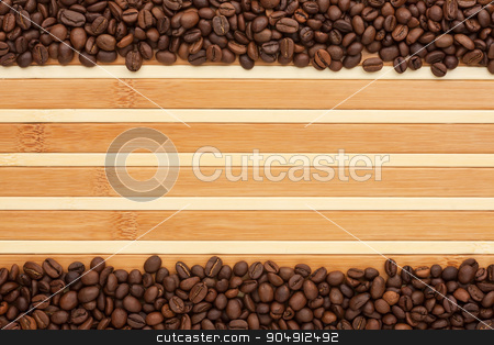 To use this stock image in your creative project, please select the size you need over to the right and click the "Add to Cart" button.
Your downloaded image will come with the Cutcaster watermark removed so don’t worry about the watermark you see on this page. Coffee beans lying on a bamboo mat stock photo, Coffee beans lying on a bamboo mat, place for your text by alekleks