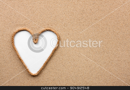 To use this stock image in your creative project, please select the size you need over to the right and click the "Add to Cart" button.
Your downloaded image will come with the Cutcaster watermark removed so don’t worry about the watermark you see on this page. Heart made of rope with a white background on the sand stock photo, Heart made of rope with a white background on the sand, with place for your text by alekleks