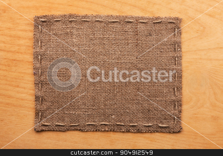 To use this stock image in your creative project, please select the size you need over to the right and click the "Add to Cart" button.
Your downloaded image will come with the Cutcaster watermark removed so don’t worry about the watermark you see on this page. Frame of burlap, lies on a background of wood stock photo, Frame of burlap, lies on a background of wood, with place for your text by alekleks