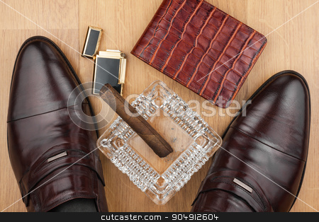 To use this stock image in your creative project, please select the size you need over to the right and click the "Add to Cart" button.
Your downloaded image will come with the Cutcaster watermark removed so don’t worry about the watermark you see on this page. Male still life, classic men's shoes and a cigar in an ashtray stock photo, Male still life, classic men's shoes and a cigar in an ashtray, can use as background by alekleks