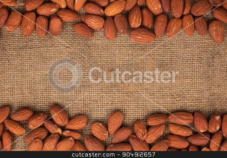 To use this stock image in your creative project, please select the size you need over to the right and click the "Add to Cart" button.
Your downloaded image will come with the Cutcaster watermark removed so don’t worry about the watermark you see on this page. Almond lying on burlap stock photo, Almond lying on burlap can be used as background by alekleks