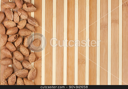 To use this stock image in your creative project, please select the size you need over to the right and click the "Add to Cart" button.
Your downloaded image will come with the Cutcaster watermark removed so don’t worry about the watermark you see on this page. unpeeled almonds lying on a bamboo mat stock photo, unpeeled almonds lying on a bamboo mat can be used as background by alekleks