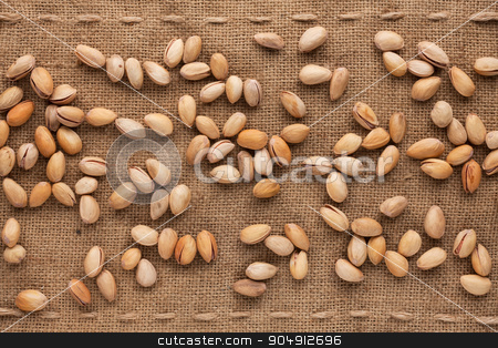 To use this stock image in your creative project, please select the size you need over to the right and click the "Add to Cart" button.
Your downloaded image will come with the Cutcaster watermark removed so don’t worry about the watermark you see on this page. Unshelled pistachios stock photo, Unshelled pistachios lying on sackcloth by alekleks