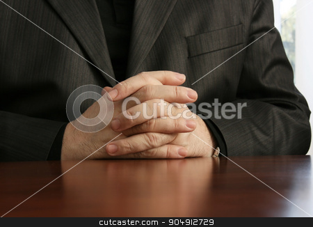 To use this stock image in your creative project, please select the size you need over to the right and click the "Add to Cart" button.
Your downloaded image will come with the Cutcaster watermark removed so don’t worry about the watermark you see on this page. Businessman stock photo, Businessman at the office with his hands folded by Mykola Komarovskyy