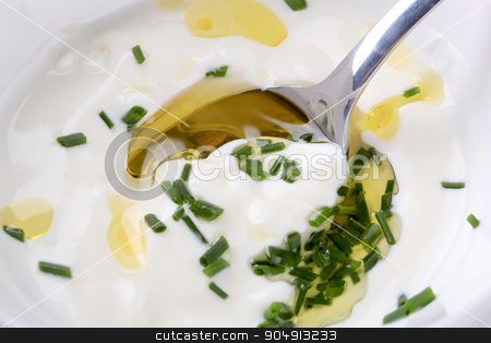 To use this stock image in your creative project, please select the size you need over to the right and click the "Add to Cart" button.
Your downloaded image will come with the Cutcaster watermark removed so don’t worry about the watermark you see on this page. Cream dipping sauce stock photo, Detail of cream dipping sauce with fresh chives by Digifoodstock