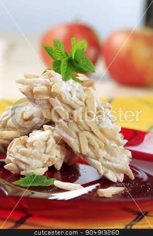 To use this stock image in your creative project, please select the size you need over to the right and click the "Add to Cart" button.
Your downloaded image will come with the Cutcaster watermark removed so don’t worry about the watermark you see on this page. Almond cookies stock photo, Vanilla cookies rolled in chopped almonds by Digifoodstock