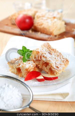 To use this stock image in your creative project, please select the size you need over to the right and click the "Add to Cart" button.
Your downloaded image will come with the Cutcaster watermark removed so don’t worry about the watermark you see on this page. Apple crumb cake stock photo, Pieces of apple crumb cake by Digifoodstock