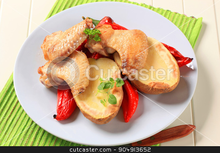 To use this stock image in your creative project, please select the size you need over to the right and click the "Add to Cart" button.
Your downloaded image will come with the Cutcaster watermark removed so don’t worry about the watermark you see on this page. Chicken wings with baked potato and pepper stock photo, Chicken wings with baked potato and red peppers by Digifoodstock