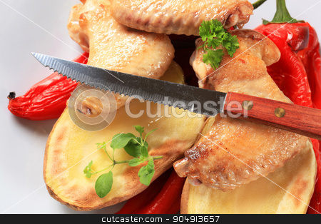 To use this stock image in your creative project, please select the size you need over to the right and click the "Add to Cart" button.
Your downloaded image will come with the Cutcaster watermark removed so don’t worry about the watermark you see on this page. Chicken wings with baked potato stock photo, Chicken wings with baked potato and red peppers by Digifoodstock