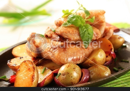 To use this stock image in your creative project, please select the size you need over to the right and click the "Add to Cart" button.
Your downloaded image will come with the Cutcaster watermark removed so don’t worry about the watermark you see on this page. Chicken wings and potatoes stock photo, Chicken wings and potatoes sprinkled with chives by Digifoodstock