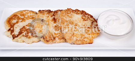 To use this stock image in your creative project, please select the size you need over to the right and click the "Add to Cart" button.
Your downloaded image will come with the Cutcaster watermark removed so don’t worry about the watermark you see on this page. Cheesecakes with sour cream. Yummy dessert stock photo, Cheesecakes with sour cream. Yummy dessert on a white background by ALEKSANDR