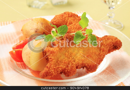 To use this stock image in your creative project, please select the size you need over to the right and click the "Add to Cart" button.
Your downloaded image will come with the Cutcaster watermark removed so don’t worry about the watermark you see on this page. Fried breaded fish with potatoes stock photo, Fried dinosaur-shaped fish nuggets with new potatoes by Digifoodstock