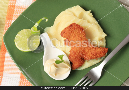 To use this stock image in your creative project, please select the size you need over to the right and click the "Add to Cart" button.
Your downloaded image will come with the Cutcaster watermark removed so don’t worry about the watermark you see on this page. Fried dinosaur-shaped nugget with mashed potato stock photo, Fried breaded dinosaur-shaped nugget with potato puree by Digifoodstock