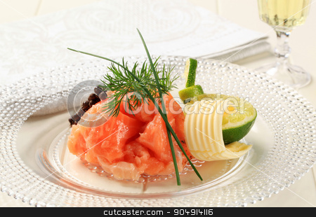 To use this stock image in your creative project, please select the size you need over to the right and click the "Add to Cart" button.
Your downloaded image will come with the Cutcaster watermark removed so don’t worry about the watermark you see on this page. Salmon Gravlax stock photo, Gravlax (cured salmon) with lime, dill and butter by Digifoodstock