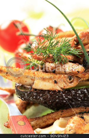 To use this stock image in your creative project, please select the size you need over to the right and click the "Add to Cart" button.
Your downloaded image will come with the Cutcaster watermark removed so don’t worry about the watermark you see on this page. Crunchy fried sprats on avocado stock photo, Avocado half topped with spicy fried sprats by Digifoodstock