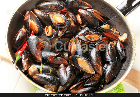 To use this stock image in your creative project, please select the size you need over to the right and click the "Add to Cart" button.
Your downloaded image will come with the Cutcaster watermark removed so don’t worry about the watermark you see on this page. Steamed mussels stock photo, Steamed mussels in a pan by Digifoodstock