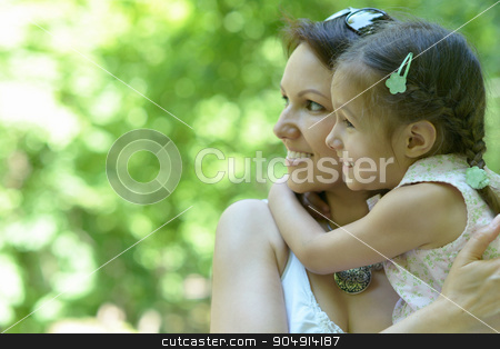 To use this stock image in your creative project, please select the size you need over to the right and click the "Add to Cart" button.
Your downloaded image will come with the Cutcaster watermark removed so don’t worry about the watermark you see on this page. Little girl with mother in park stock photo, Little cute girl with her mother in summer park by Ruslan Huzau