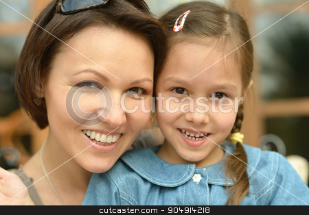 To use this stock image in your creative project, please select the size you need over to the right and click the "Add to Cart" button.
Your downloaded image will come with the Cutcaster watermark removed so don’t worry about the watermark you see on this page. Little girl with mother on walk stock photo, Little cute girl with happy mother on a walk by Ruslan Huzau