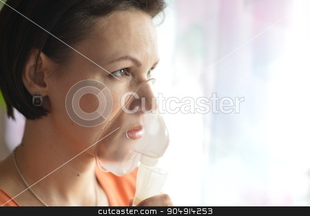 To use this stock image in your creative project, please select the size you need over to the right and click the "Add to Cart" button.
Your downloaded image will come with the Cutcaster watermark removed so don’t worry about the watermark you see on this page. Young woman doing inhalation stock photo, Portrait of a young woman doing inhalation at home by Ruslan Huzau
