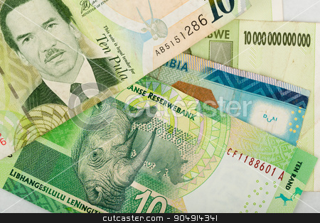 To use this stock image in your creative project, please select the size you need over to the right and click the "Add to Cart" button.
Your downloaded image will come with the Cutcaster watermark removed so don’t worry about the watermark you see on this page. South african countries banknotes stock photo, South african countries banknotes for background. Botswana pula, Namibian dollar, South Africa rand and Zimbabwe dollars. by Artush