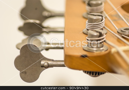 To use this stock image in your creative project, please select the size you need over to the right and click the "Add to Cart" button.
Your downloaded image will come with the Cutcaster watermark removed so don’t worry about the watermark you see on this page. Electric bass tuning heads stock photo, close up of tuning heads of a electric bass by rarrarorro