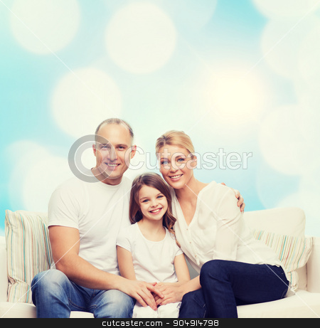 To use this stock image in your creative project, please select the size you need over to the right and click the "Add to Cart" button.
Your downloaded image will come with the Cutcaster watermark removed so don’t worry about the watermark you see on this page. happy family at home stock photo, family, childhood, holidays and people concept - smiling mother, father and little girl over blue lights background by Syda Productions