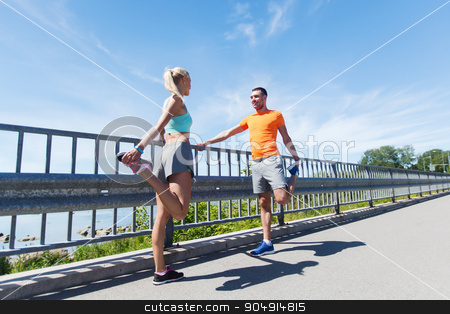 To use this stock image in your creative project, please select the size you need over to the right and click the "Add to Cart" button.
Your downloaded image will come with the Cutcaster watermark removed so don’t worry about the watermark you see on this page. smiling couple stretching outdoors stock photo, fitness, sport, training and lifestyle concept - smiling couple stretching outdoors by Syda Productions