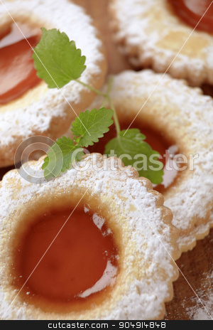 To use this stock image in your creative project, please select the size you need over to the right and click the "Add to Cart" button.
Your downloaded image will come with the Cutcaster watermark removed so don’t worry about the watermark you see on this page. Jam biscuits stock photo, Jam biscuits sprinkled with icing sugar - detail by Digifoodstock