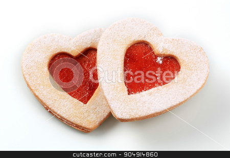 To use this stock image in your creative project, please select the size you need over to the right and click the "Add to Cart" button.
Your downloaded image will come with the Cutcaster watermark removed so don’t worry about the watermark you see on this page. Heart shaped shortbread cookies stock photo, Heart shaped shortbread cookies with jam filling by Digifoodstock