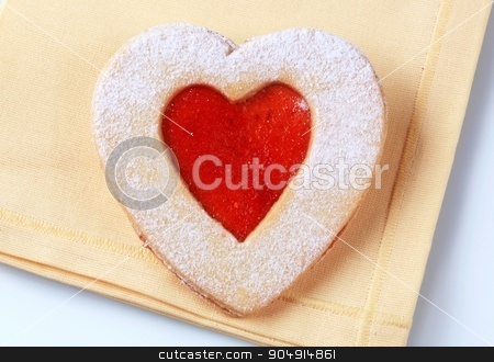 To use this stock image in your creative project, please select the size you need over to the right and click the "Add to Cart" button.
Your downloaded image will come with the Cutcaster watermark removed so don’t worry about the watermark you see on this page. Heart shaped shortbread cookie stock photo, Heart shaped shortbread cookie with jam filling by Digifoodstock