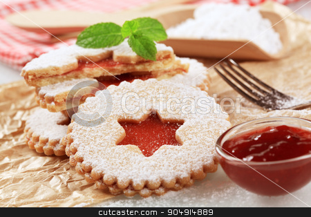 To use this stock image in your creative project, please select the size you need over to the right and click the "Add to Cart" button.
Your downloaded image will come with the Cutcaster watermark removed so don’t worry about the watermark you see on this page. Jam shortbread cookies stock photo, Christmas shortbread cookies with jam filling - detail by Digifoodstock