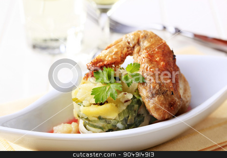 To use this stock image in your creative project, please select the size you need over to the right and click the "Add to Cart" button.
Your downloaded image will come with the Cutcaster watermark removed so don’t worry about the watermark you see on this page. Roast chicken and potatoes stock photo, Roast chicken wing and potatoes with spring onion by Digifoodstock