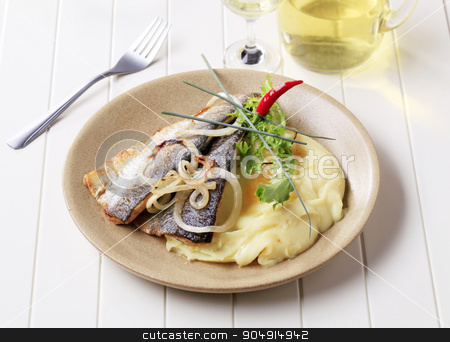 To use this stock image in your creative project, please select the size you need over to the right and click the "Add to Cart" button.
Your downloaded image will come with the Cutcaster watermark removed so don’t worry about the watermark you see on this page. Pan fried trout with mashed potatoes stock photo, Pan fried trout fillets with potato puree by Digifoodstock