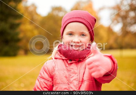 To use this stock image in your creative project, please select the size you need over to the right and click the "Add to Cart" button.
Your downloaded image will come with the Cutcaster watermark removed so don’t worry about the watermark you see on this page. happy little girl showing thumbs up in autumn park stock photo, autumn, childhood, nature and people concept - happy little girl showing thumbs up in park by Syda Productions