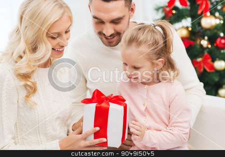 To use this stock image in your creative project, please select the size you need over to the right and click the "Add to Cart" button.
Your downloaded image will come with the Cutcaster watermark removed so don’t worry about the watermark you see on this page. happy family at home with christmas gift box stock photo, family, christmas, holidays and people concept - happy mother, father and little daughter with gift box sitting on sofa at home by Syda Productions