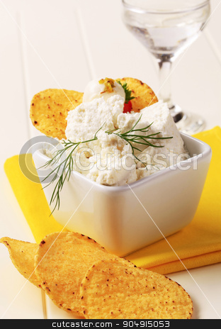 To use this stock image in your creative project, please select the size you need over to the right and click the "Add to Cart" button.
Your downloaded image will come with the Cutcaster watermark removed so don’t worry about the watermark you see on this page. Corn chips and curd cheese stock photo, Corn chips and bowl of curd cheese by Digifoodstock