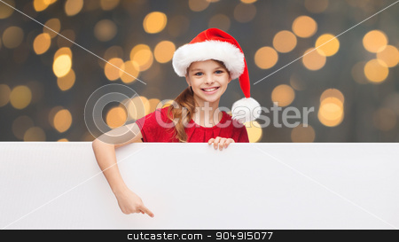 To use this stock image in your creative project, please select the size you need over to the right and click the "Add to Cart" button.
Your downloaded image will come with the Cutcaster watermark removed so don’t worry about the watermark you see on this page. child in santa helper hat with blank white board stock photo, christmas, people, children and advertisement concept - happy girl child in santa helper hat pointing finger on blank white board over golden lights background by Syda Productions