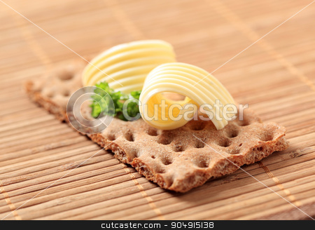 To use this stock image in your creative project, please select the size you need over to the right and click the "Add to Cart" button.
Your downloaded image will come with the Cutcaster watermark removed so don’t worry about the watermark you see on this page. Crisp bread and butter stock photo, Crisp bread and curls of fresh butter by Digifoodstock